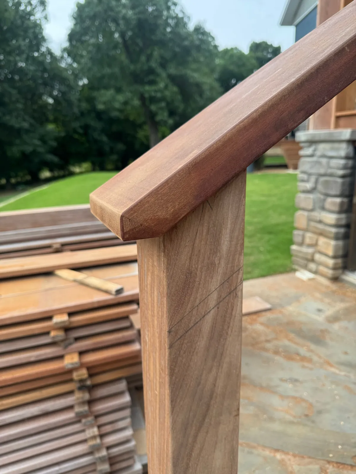 Finished ipe handrail cap and post joint